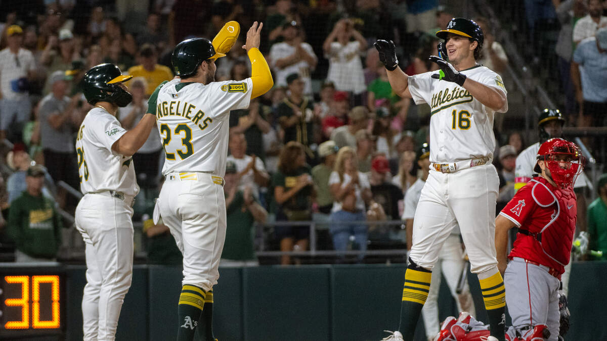 Athletics first base Nick Kurtz (16) celebrates with Shea Langeliers (23) and Carlos Cortes (26) after Kurtz’s three-run home run in the eighth inning during a game against the Los Angeles Angels at Sutter Health Park on Aug. 15, 2025, in West Sacramento. Athletics first base Nick Kurtz (16) celebrates with Shea Langeliers (23) and Carlos Cortes (26) after Kurtz’s three-run home run in the eighth inning during a game against the Los Angeles Angels at Sutter Health Park on Aug. 15, 2025, in West Sacramento.